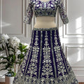 Royal Purple Heavy Embroidered Butterfly Net Lehenga Choli with Dupatta