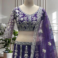 Royal Purple Heavy Embroidered Butterfly Net Lehenga Choli with Dupatta