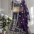 Royal Purple Heavy Embroidered Butterfly Net Lehenga Choli with Dupatta