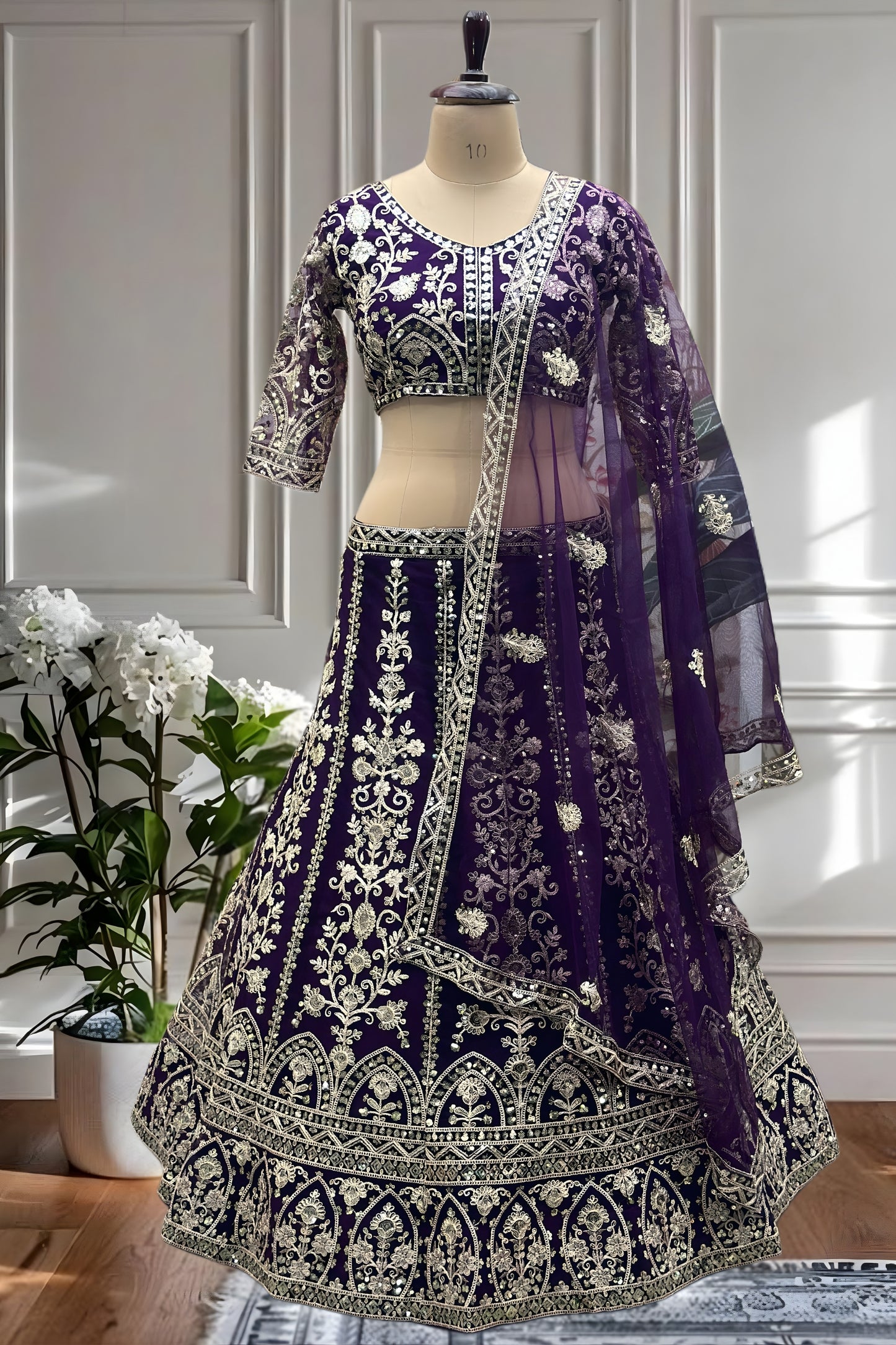Royal Purple Heavy Embroidered Butterfly Net Lehenga Choli with Dupatta