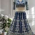 Elegant Teal Blue Heavy Embroidered Butterfly Net Lehenga Choli with Dupatta