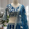 Elegant Teal Blue Heavy Embroidered Butterfly Net Lehenga Choli with Dupatta