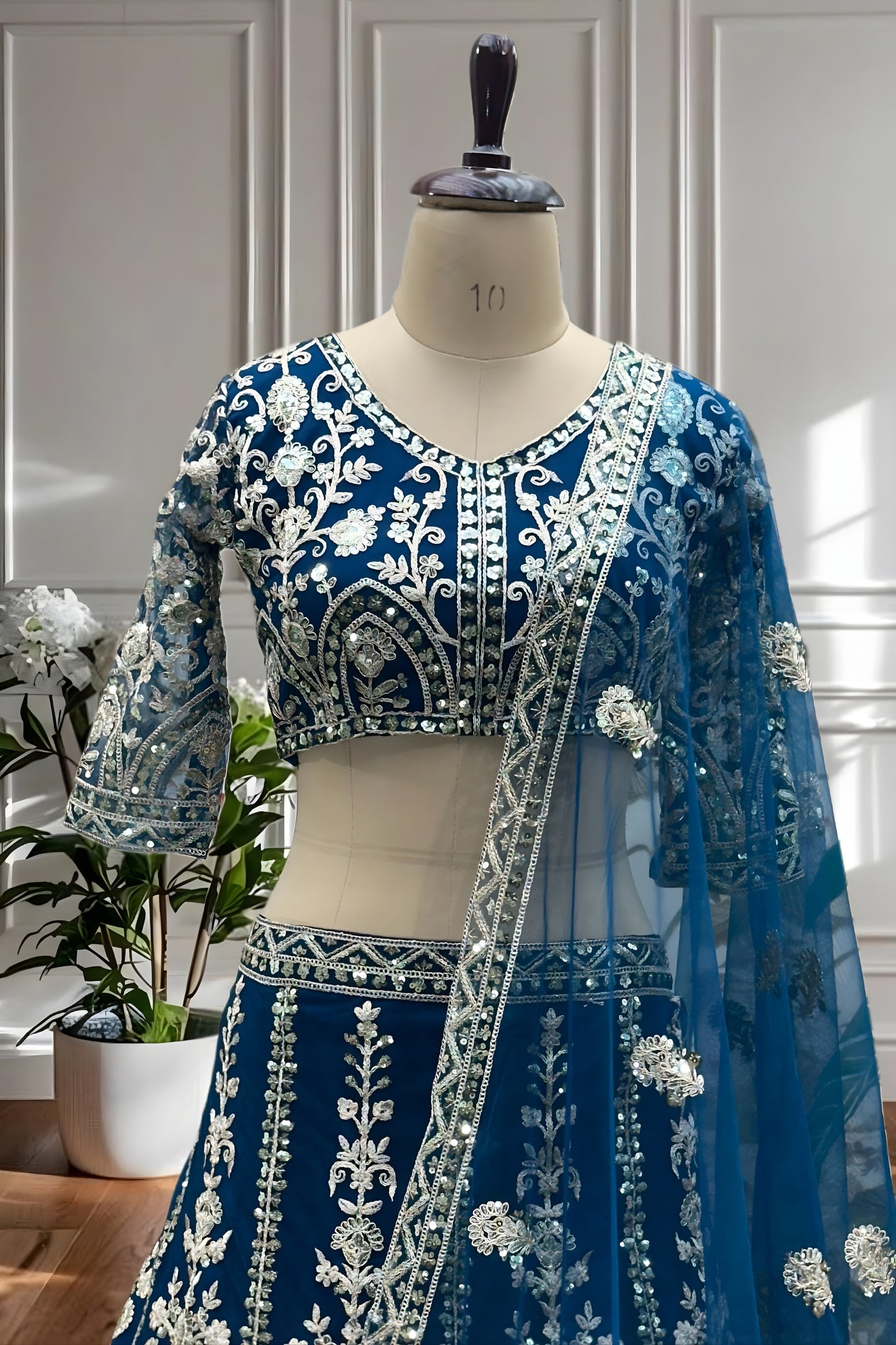 Elegant Teal Blue Heavy Embroidered Butterfly Net Lehenga Choli with Dupatta
