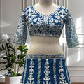 Elegant Teal Blue Heavy Embroidered Butterfly Net Lehenga Choli with Dupatta