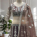 Trendy Chocolate Brown Heavy Embroidered Butterfly Net Lehenga Choli with Dupatta