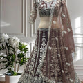 Trendy Chocolate Brown Heavy Embroidered Butterfly Net Lehenga Choli with Dupatta