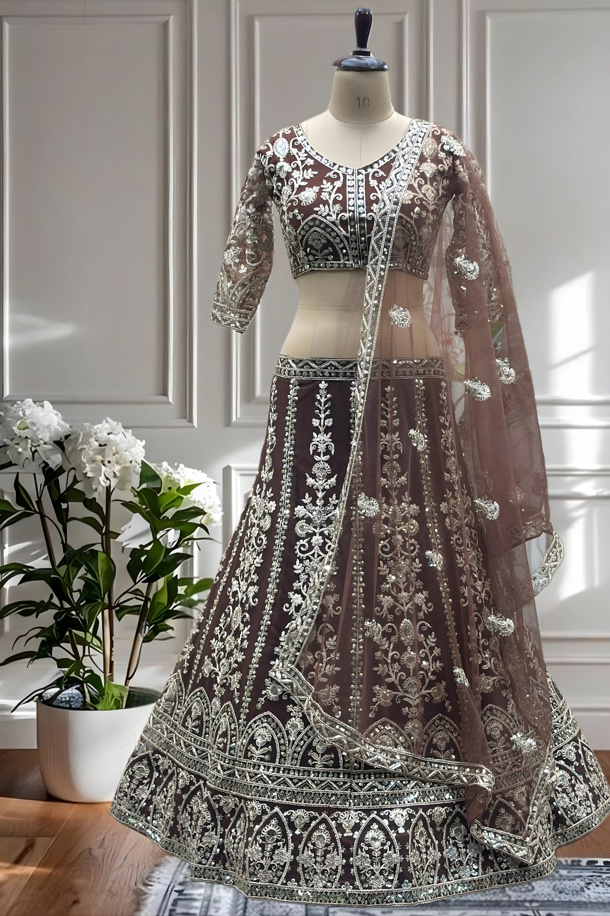 Trendy Chocolate Brown Heavy Embroidered Butterfly Net Lehenga Choli with Dupatta