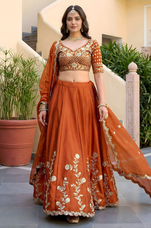 Awesome Rust Orange Rangoli Silk Lehenga Choli with Embroidery Work and Matching Dupatta