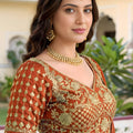 Awesome Rust Orange Rangoli Silk Lehenga Choli with Embroidery Work and Matching Dupatta