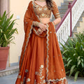 Awesome Rust Orange Rangoli Silk Lehenga Choli with Embroidery Work and Matching Dupatta