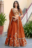 Awesome Rust Orange Rangoli Silk Lehenga Choli with Embroidery Work and Matching Dupatta