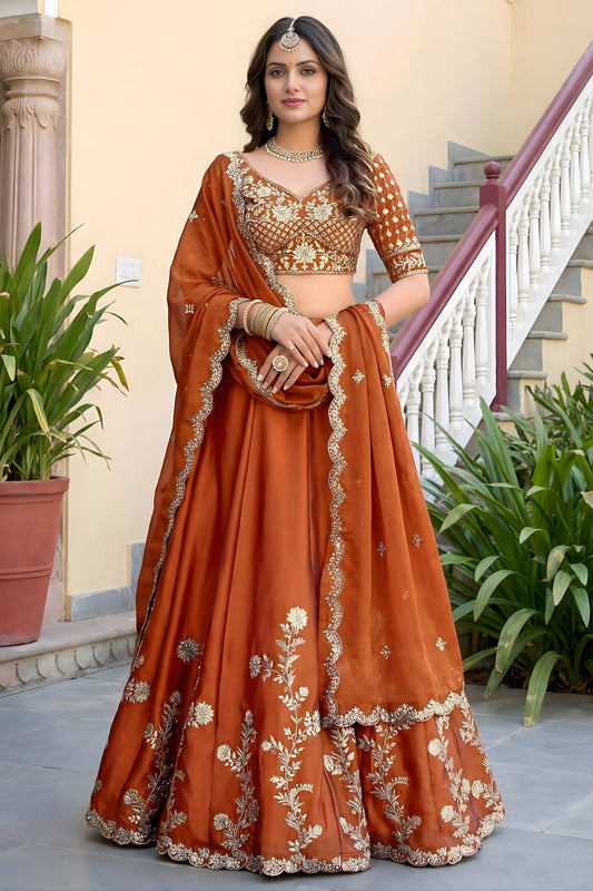 Awesome Rust Orange Rangoli Silk Lehenga Choli with Embroidery Work and Matching Dupatta