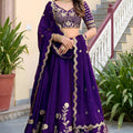 Unique Purple Rangoli Silk Lehenga Choli with Embroidery Work and Matching Dupatta