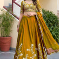 Vibrant Mustard Yellow Rangoli Silk Lehenga Choli with Embroidery Work and Matching Dupatta