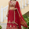 Regal Red Faux Georgette Heavy Embroidered Designer Lehenga Choli with Gold Zari Work and Dupatta