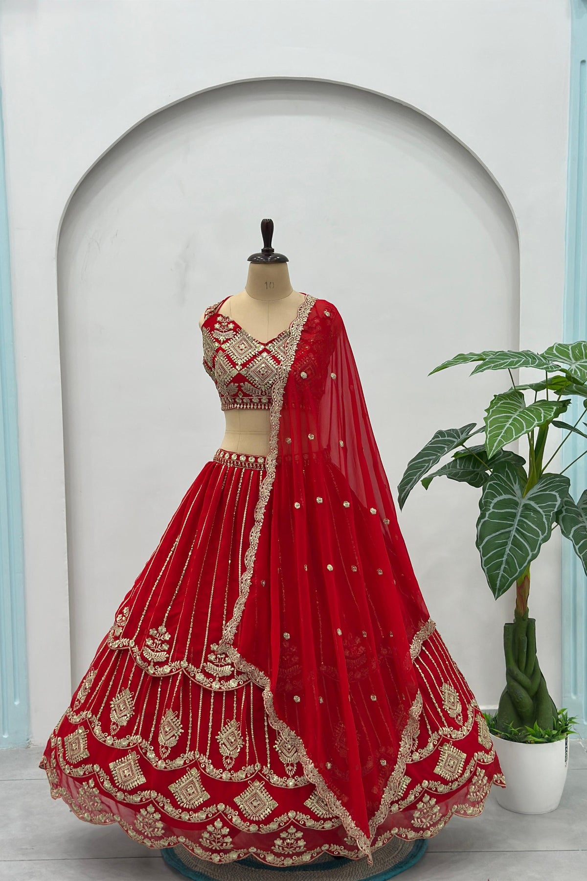 Regal Red Faux Georgette Heavy Embroidered Designer Lehenga Choli with Gold Zari Work and Dupatta