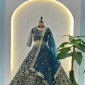 Stunning Teal Blue Butterfly Net Embroidered Bridal Lehenga Choli with Dupatta