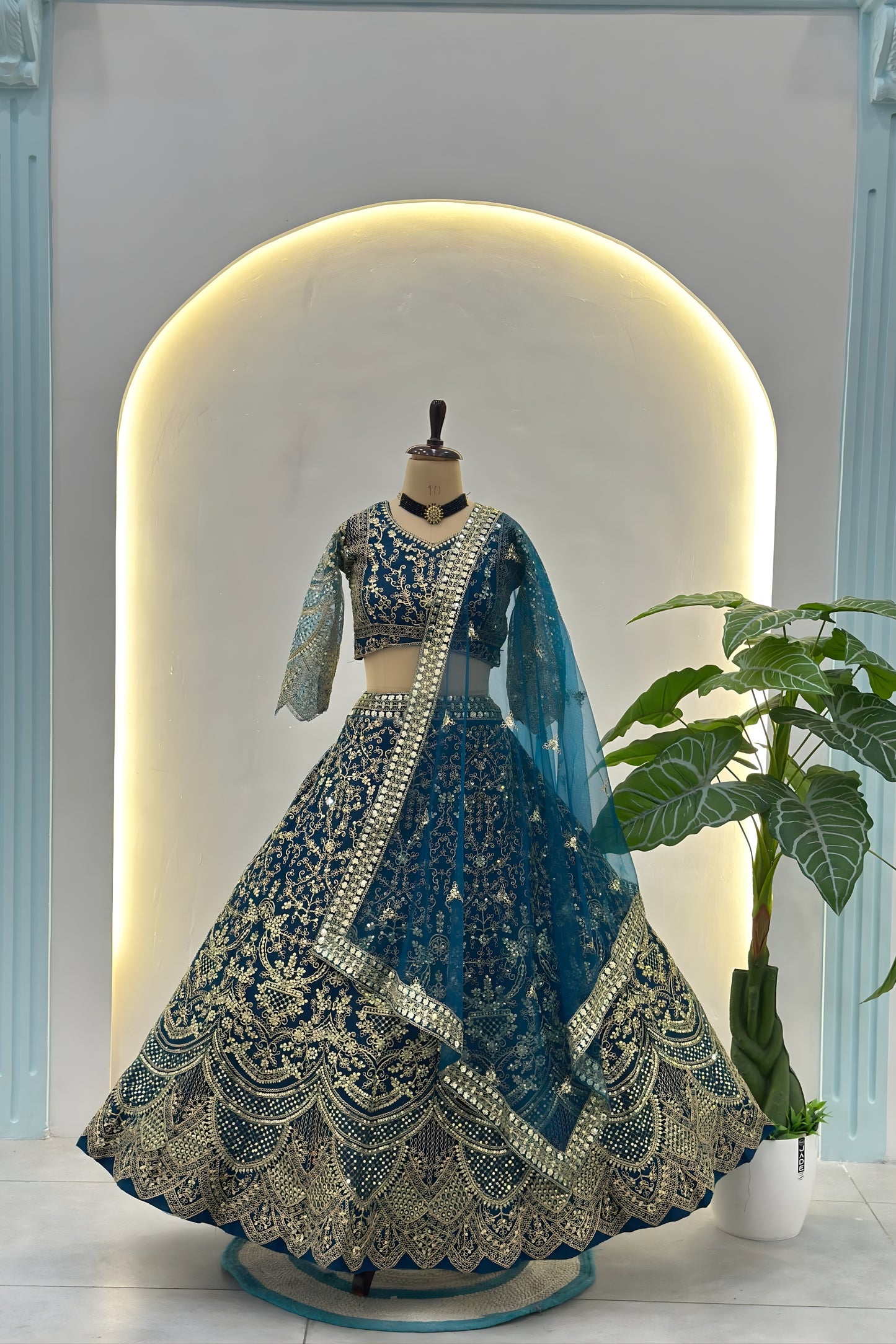 Stunning Teal Blue Butterfly Net Embroidered Bridal Lehenga Choli with Dupatta