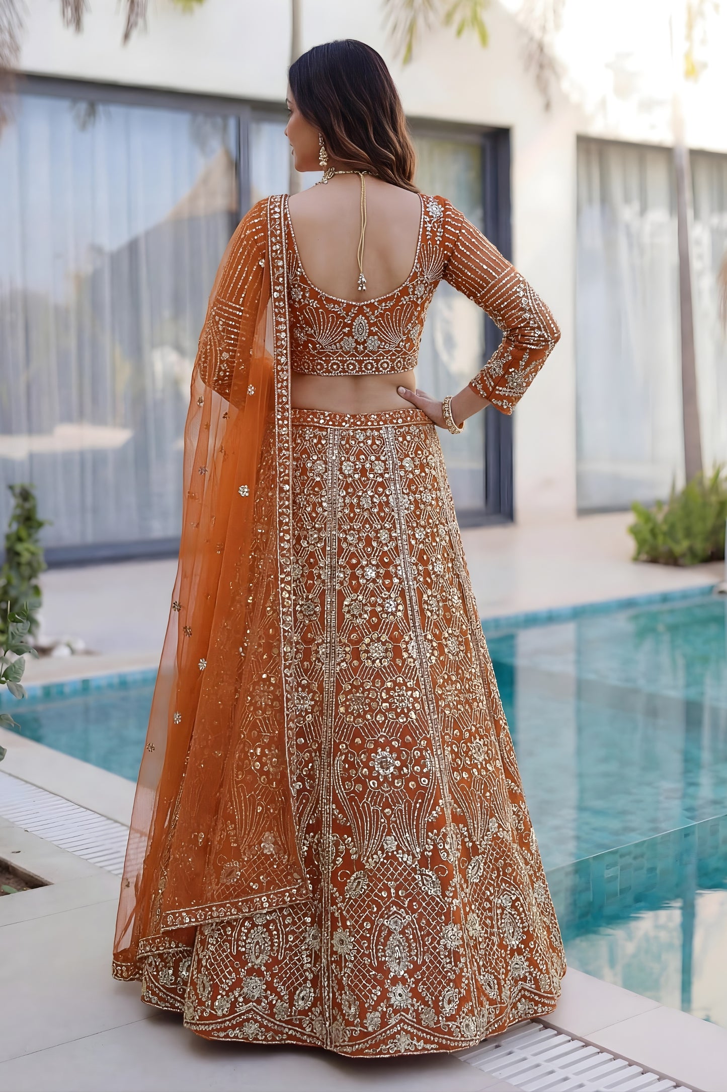 Awesome Rust Orange Butterfly Net Heavy Embroidered Bridal Lehenga Choli with Dupatta