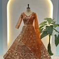 Awesome Rust Orange Butterfly Net Heavy Embroidered Bridal Lehenga Choli with Dupatta