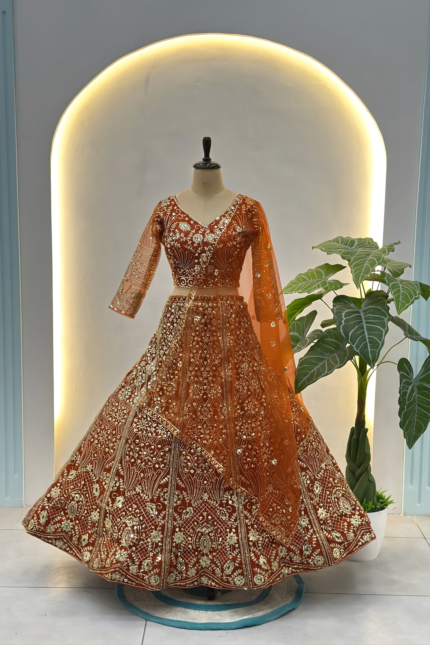 Awesome Rust Orange Butterfly Net Heavy Embroidered Bridal Lehenga Choli with Dupatta