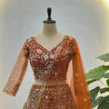 Awesome Rust Orange Butterfly Net Heavy Embroidered Bridal Lehenga Choli with Dupatta
