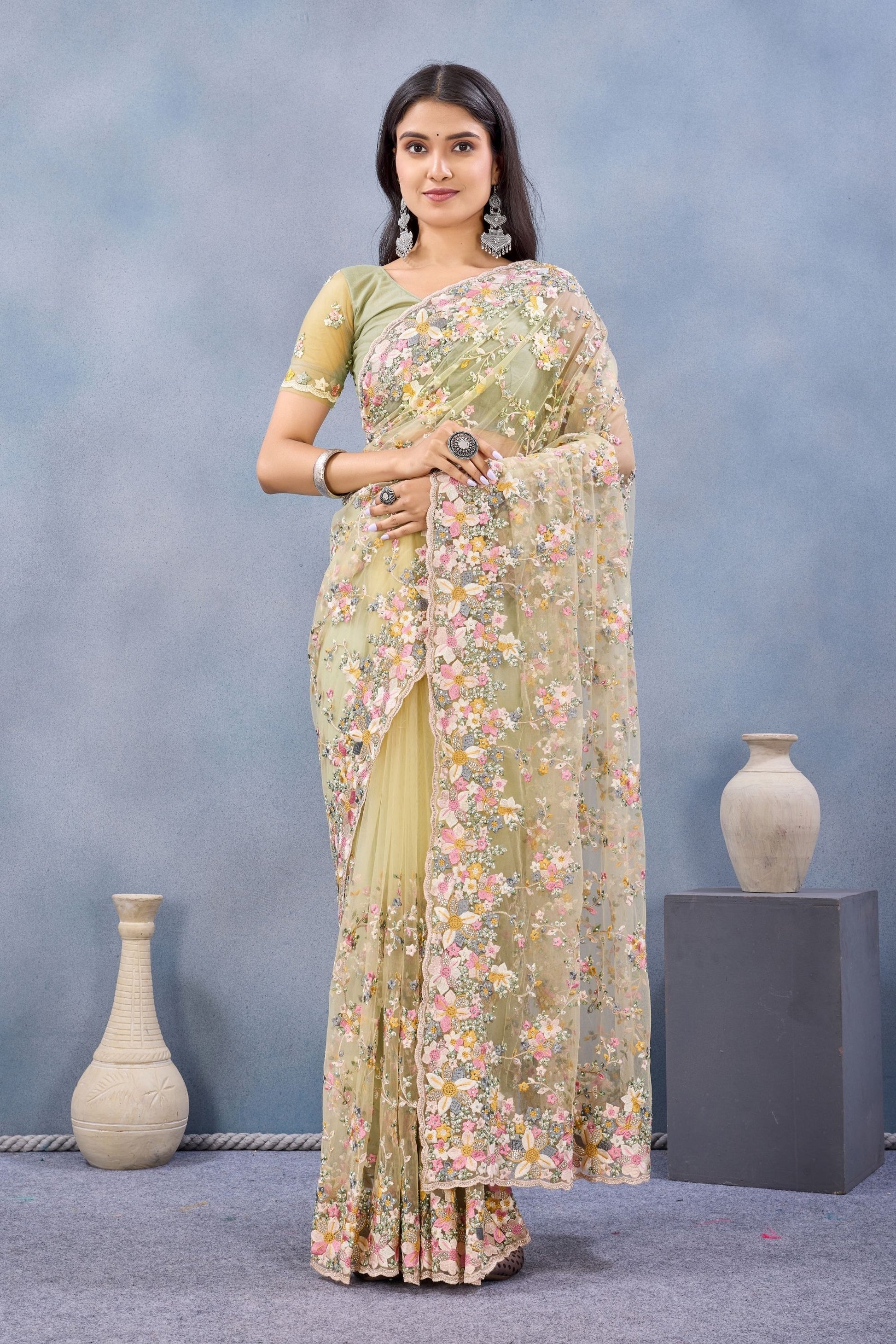 Pastel Yellow Floral Embroidered Net Saree with Designer Border