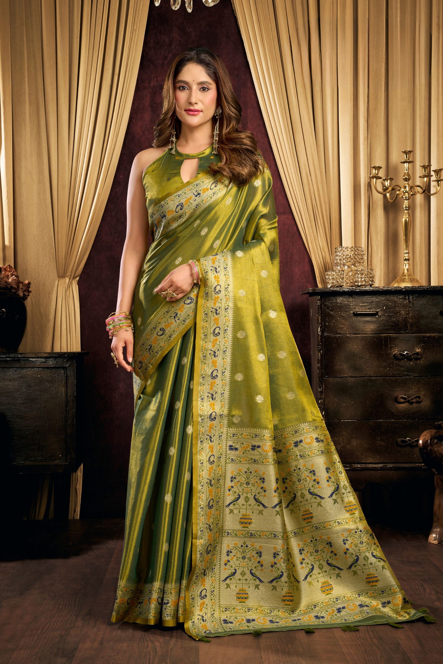 Graceful Olive Green Tissue Silk Zari Weaving Saree