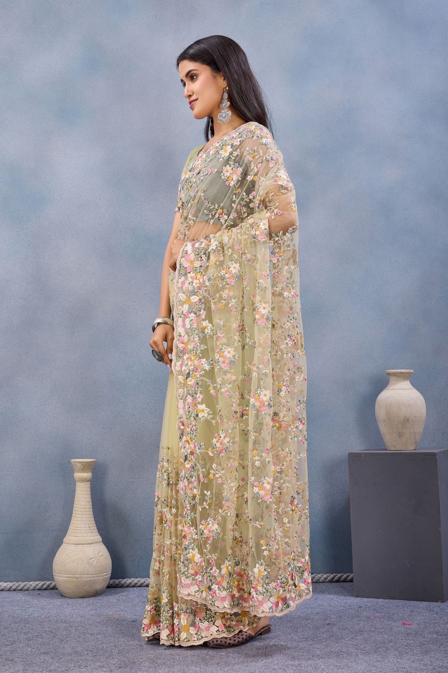 Pastel Yellow Floral Embroidered Net Saree with Designer Border