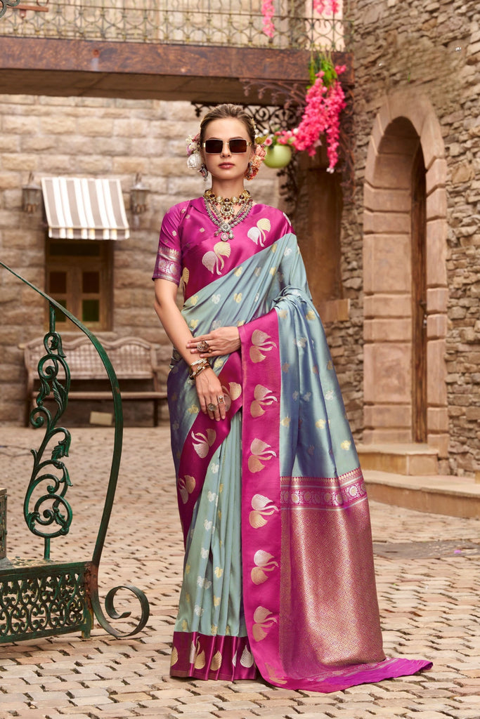 Sky Blue And Magenta with Gold Zari Motifs and Rich Border 