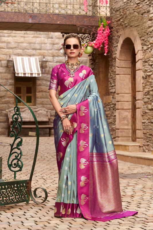 Sky Blue And Magenta with Gold Zari Motifs and Rich Border 