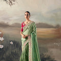 Designer Sage Green Silk Saree Contrasting Red Embroidered Blouse