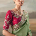 Designer Sage Green Silk Saree Contrasting Red Embroidered Blouse