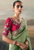 Designer Sage Green Silk Saree Contrasting Red Embroidered Blouse
