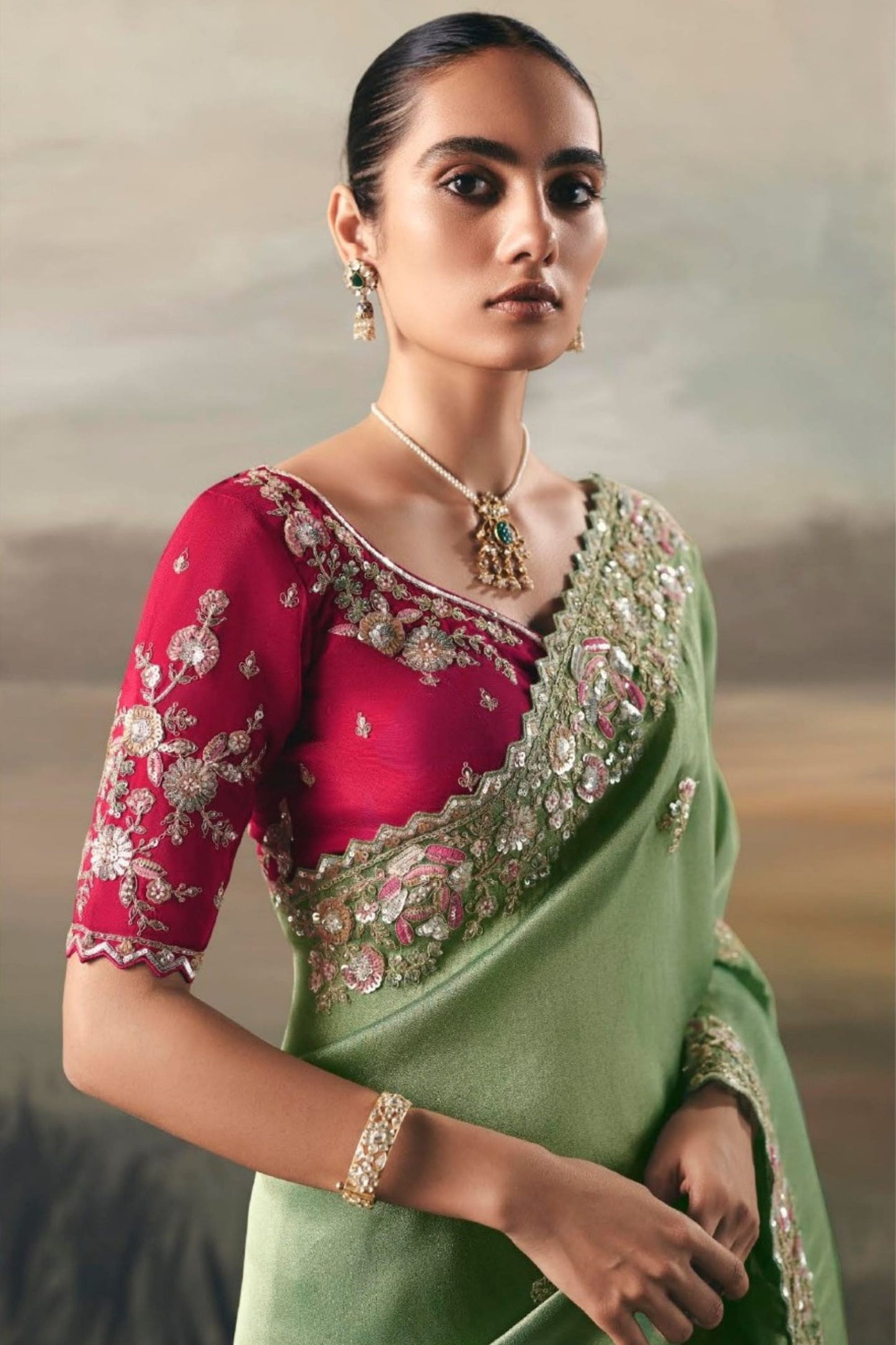 Designer Sage Green Silk Saree Contrasting Red Embroidered Blouse