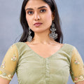 Pastel Yellow Floral Embroidered Net Saree with Designer Border