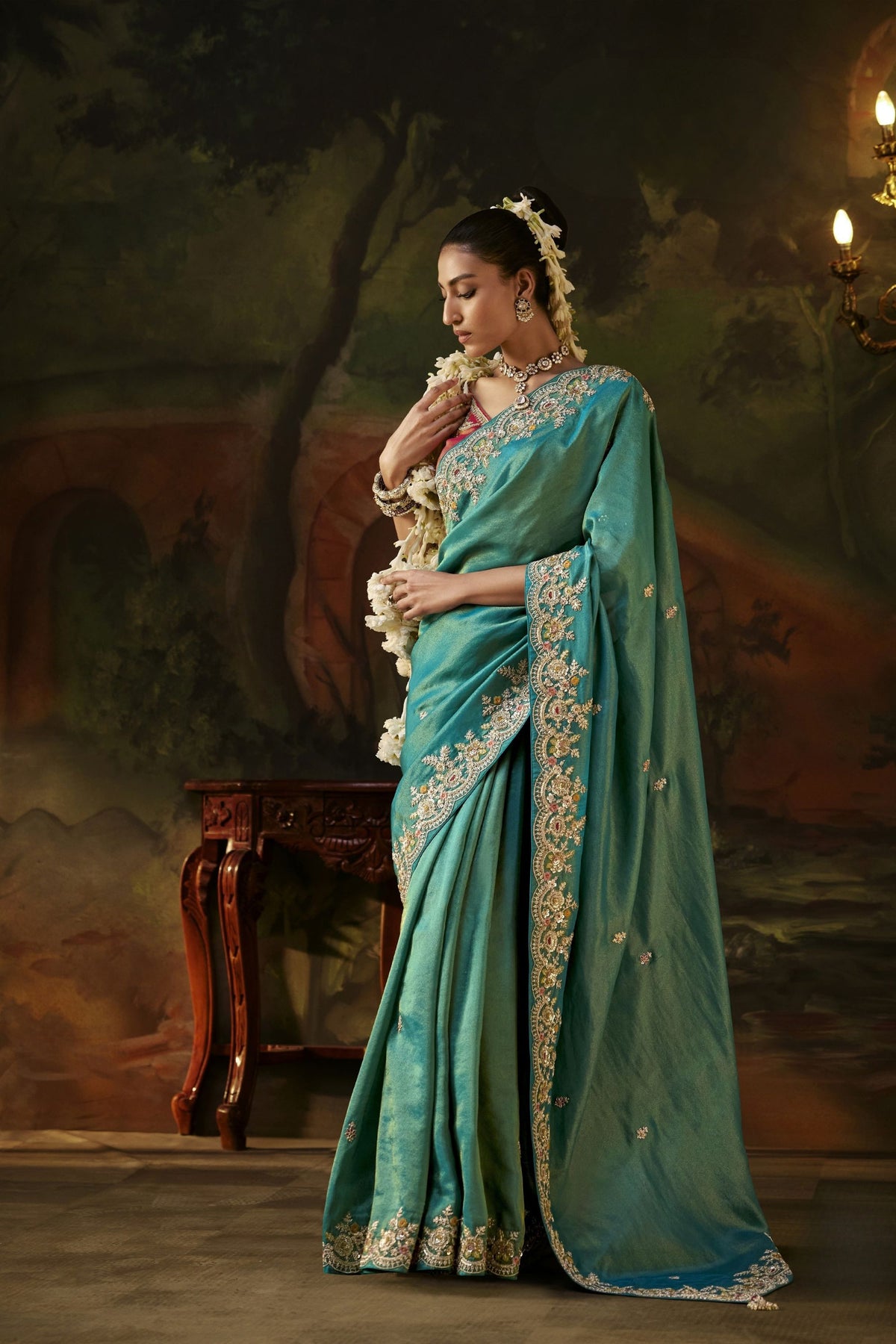 Graceful Teal Green Premium Viscose Zari Embroidery Saree for Women