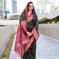 Black And Magenta Patola Print Banarasi Silk Saree with Zari Border