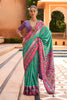 Elegant Sea Green Patola Silk Saree Purple Ikat Border Woven Design