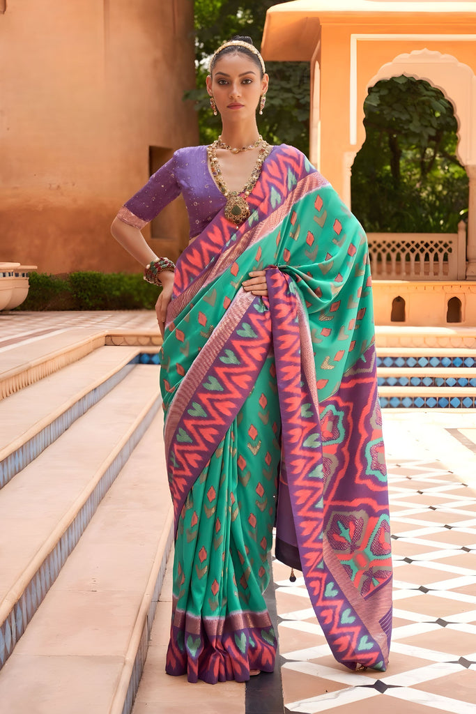 Elegant Sea Green Patola Silk Saree Purple Ikat Border Woven Design