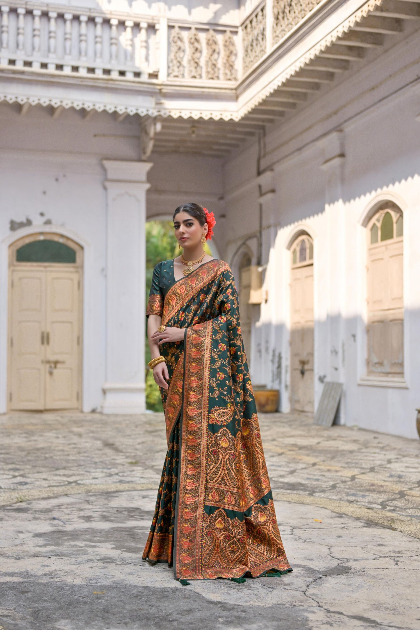 Dark Green Traditional Silk Saree with Rich Paisley Border