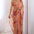 Peach Floral Printed Georgette Saree with Sequins Border Spaghetti Blouse