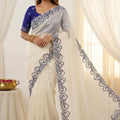 Off White Organza Saree with Blue Embroidered Border