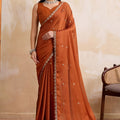 Rust Orange Georgette Saree with Silver Zari Border Butti Work 