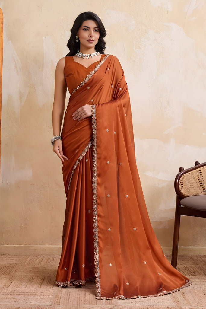 Rust Orange Georgette Saree with Silver Zari Border Butti Work 