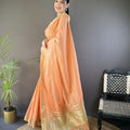Peach Linen Silk Saree with Rich Golden Zari Border Tassel Pallu
