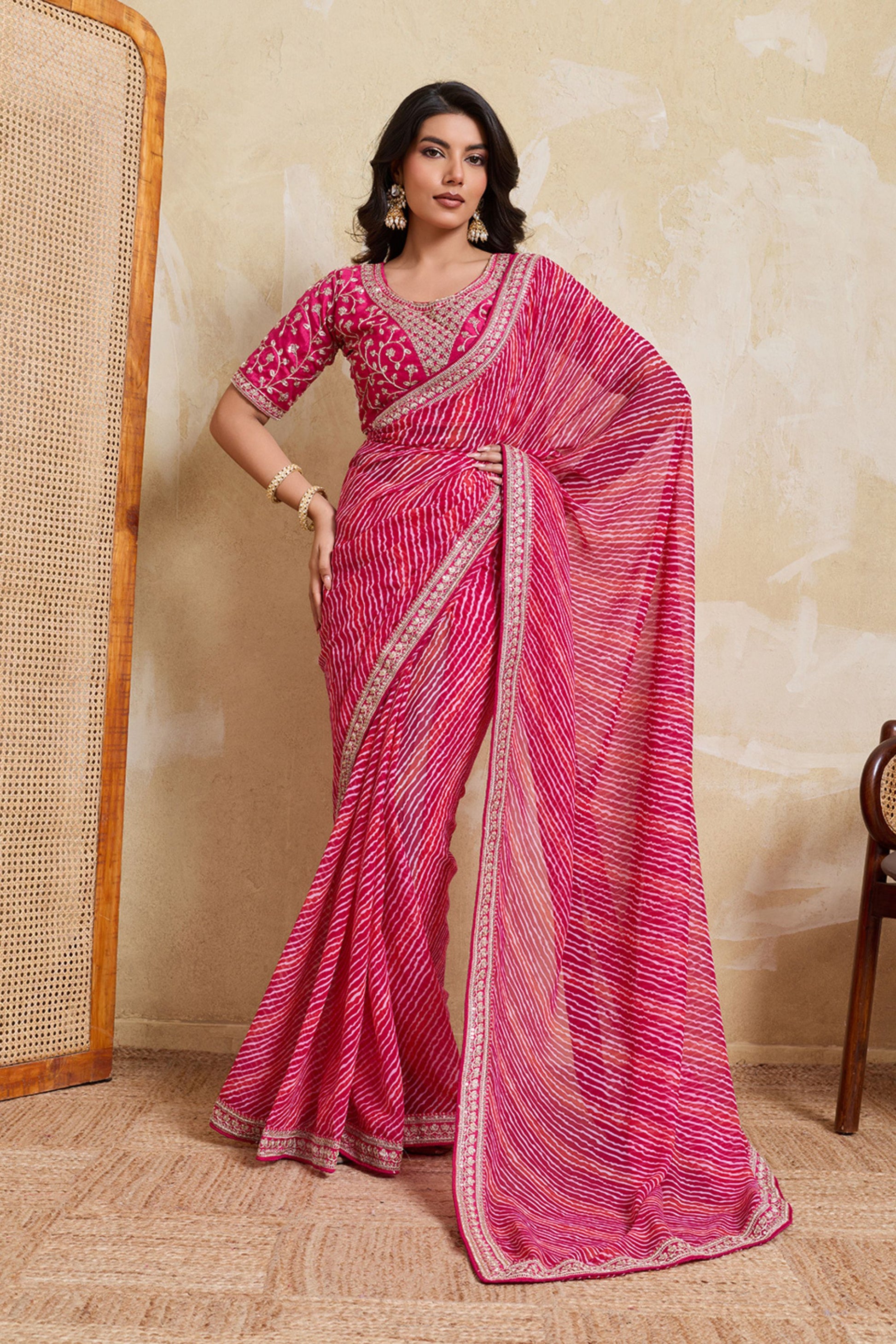 Pink Georgette Saree with Golden Embroidered Border Designer Blouse