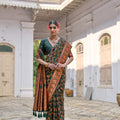 Dark Green Traditional Silk Saree with Rich Paisley Border
