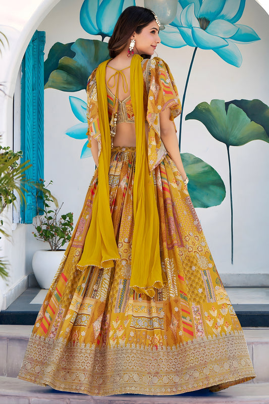 Fancy Yellow Multicolor Printed and Embroidered Chinnon Silk Lehenga Choli Set with Shrug for Wedding