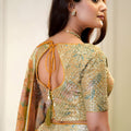 Glorious Orange Floral Printed Lehenga Choli with Mirror Work and Matching Dupatta for Wedding